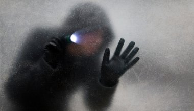 Sonhar com ladrão armado