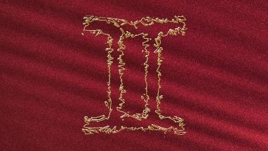 Imagem do glifo do signo de gêmeos em dourado no fundo vermelho.