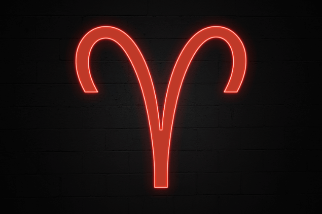 No foco da imagem, há o símbolo do signo de Áries.