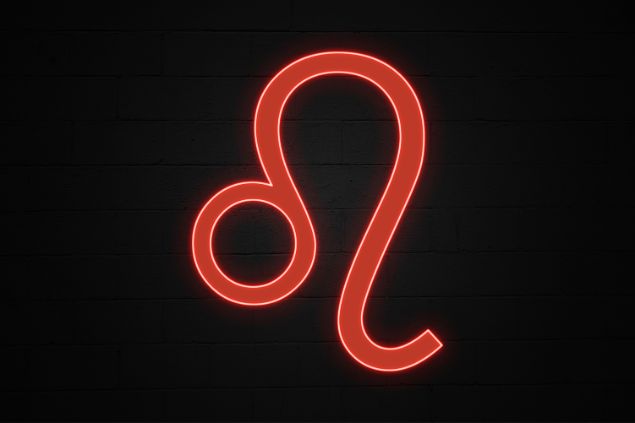 Gwengoat /Getty Images Signature / Canva Imagem de fundo preto e em destaque o glifo do signo de leão na cor vermelha.