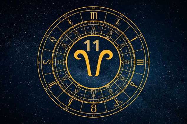 Imagem de uma mandala astrológica com o glifo de touro junto com o número 11 posicionados no centro