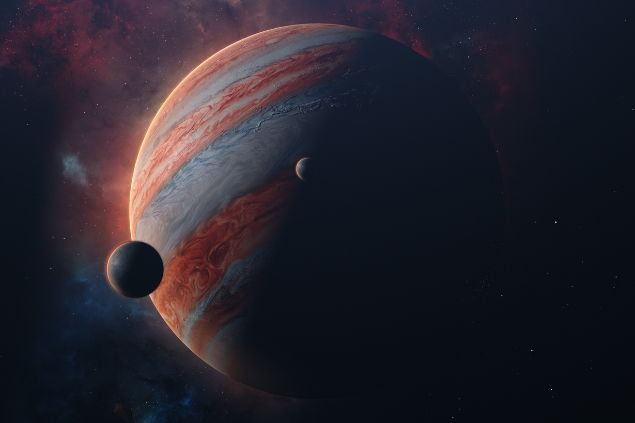 Planeta Júpiter rodeado por outros astros.