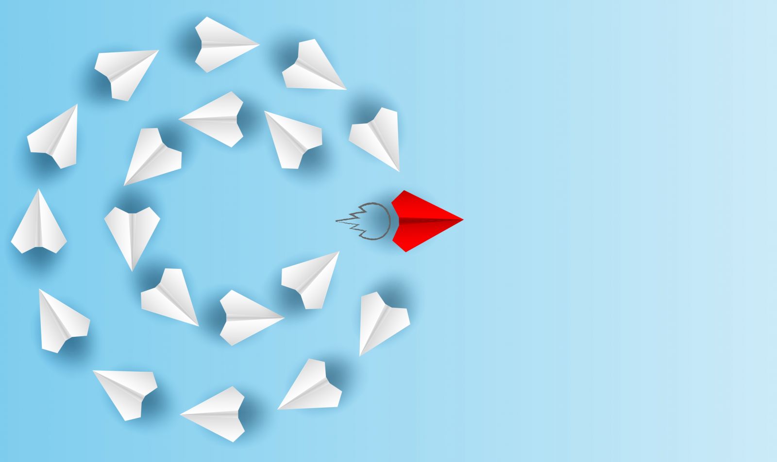 lim_pix / Shutterstock.com Avião de papel vermelho desviando de um fluxo de aviões brancos
